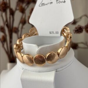 Laura Ford Goldtone circles ,stretch bracelet